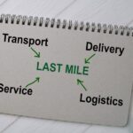 Last-mile delivery rider handing a parcel to a customer